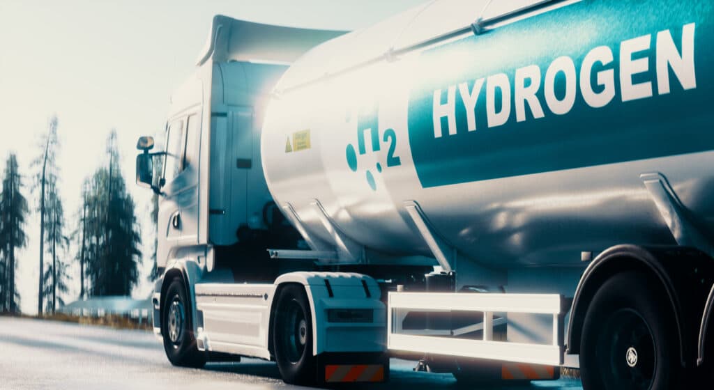 A tanker truck with H2 and hydrogen written on the side.