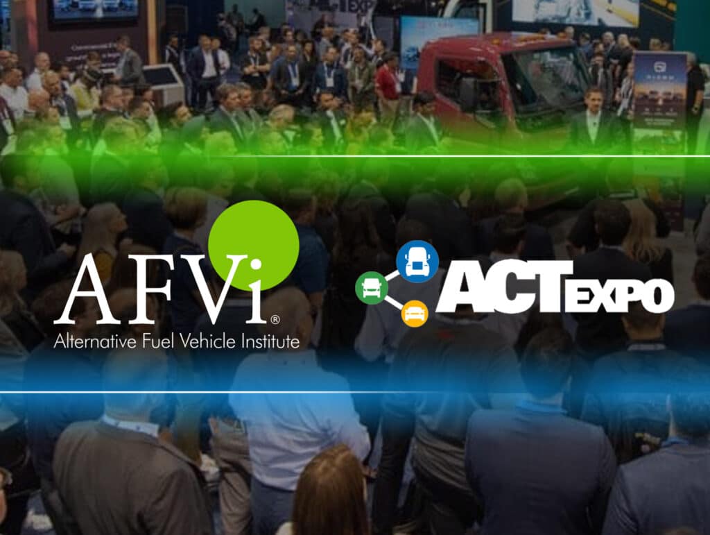 The AFVi and ACT Expo logos are displayed in front of a group of people on a trade show floor.